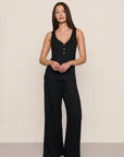 Model is wearing Dream Rib Wide Leg Pant in Black