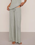 Model is wearing Dream Rib Wide Leg Pant in Dark Heather Grey