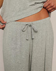 Model is wearing Dream Rib Wide Leg Pant in Dark Heather Grey