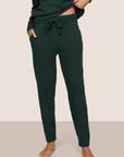 Model is wearing Recycled Boucle Relaxed Fit Jogger  in Pine