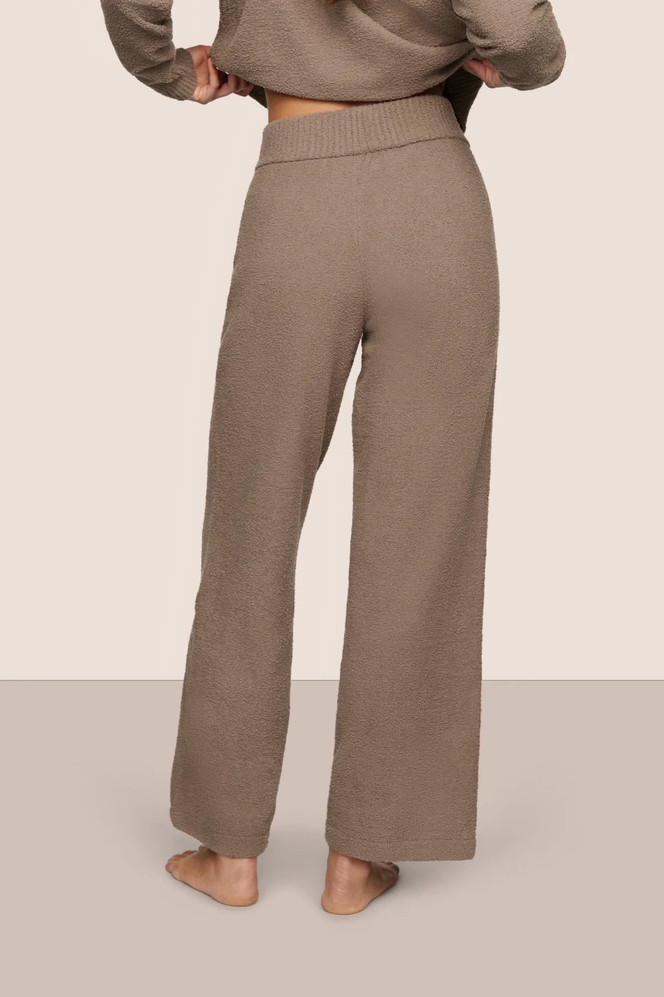 Model is wearing Recycled Boucle Pant  in Deep Taupe