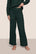 Model is wearing Recycled Boucle Pant  in Pine