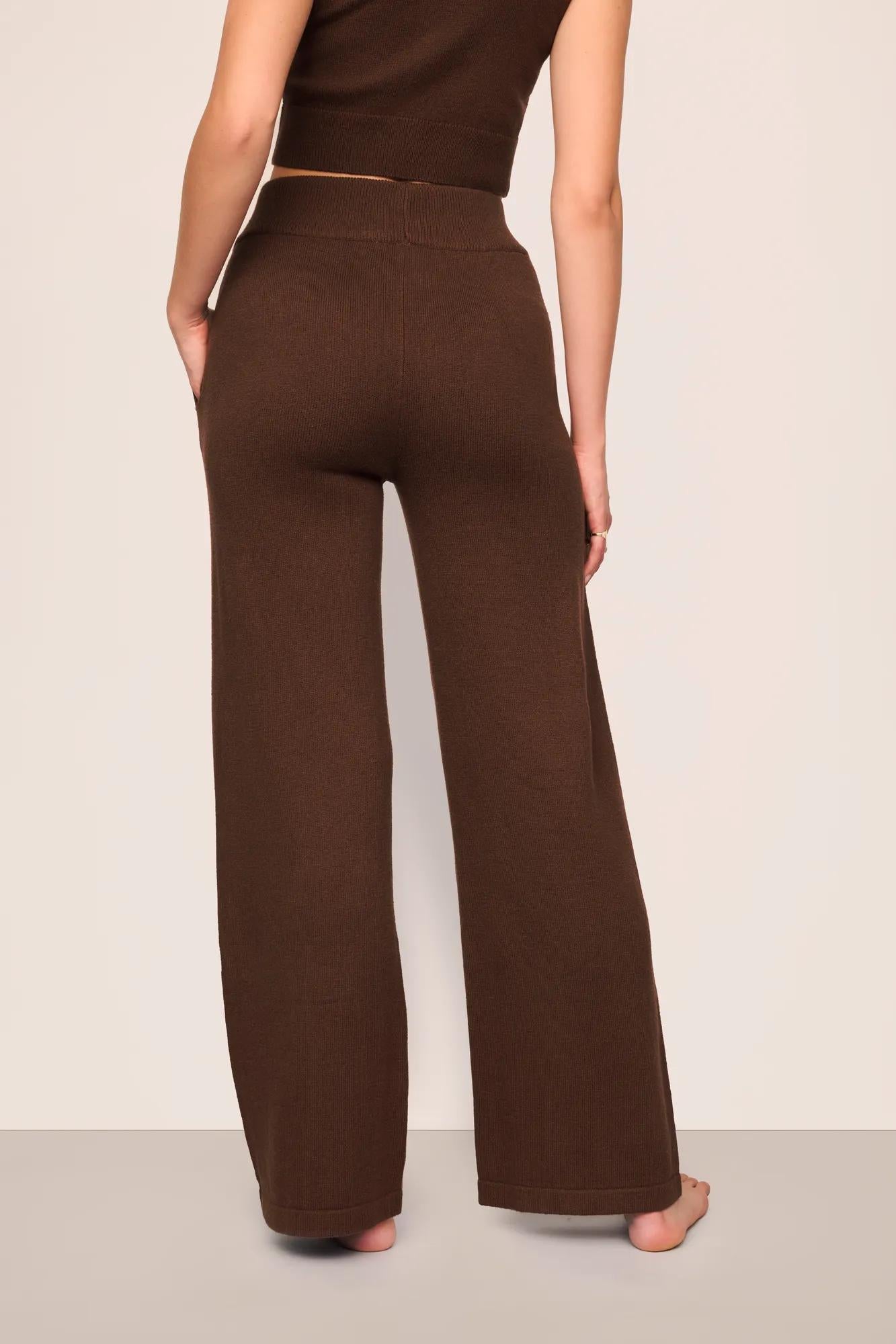 Model is wearing Recycled Sweater Pant  in  Chocolate
