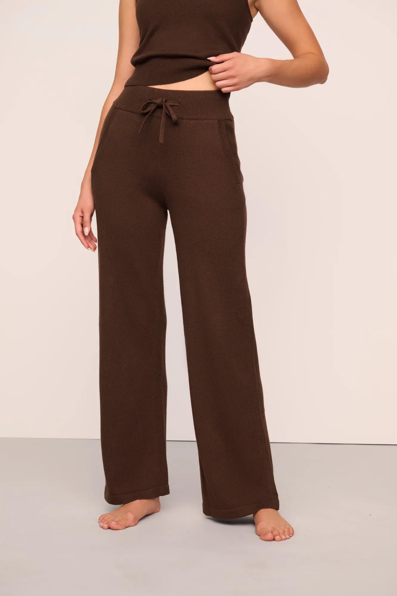Model is wearing Recycled Sweater Pant  in  Chocolate