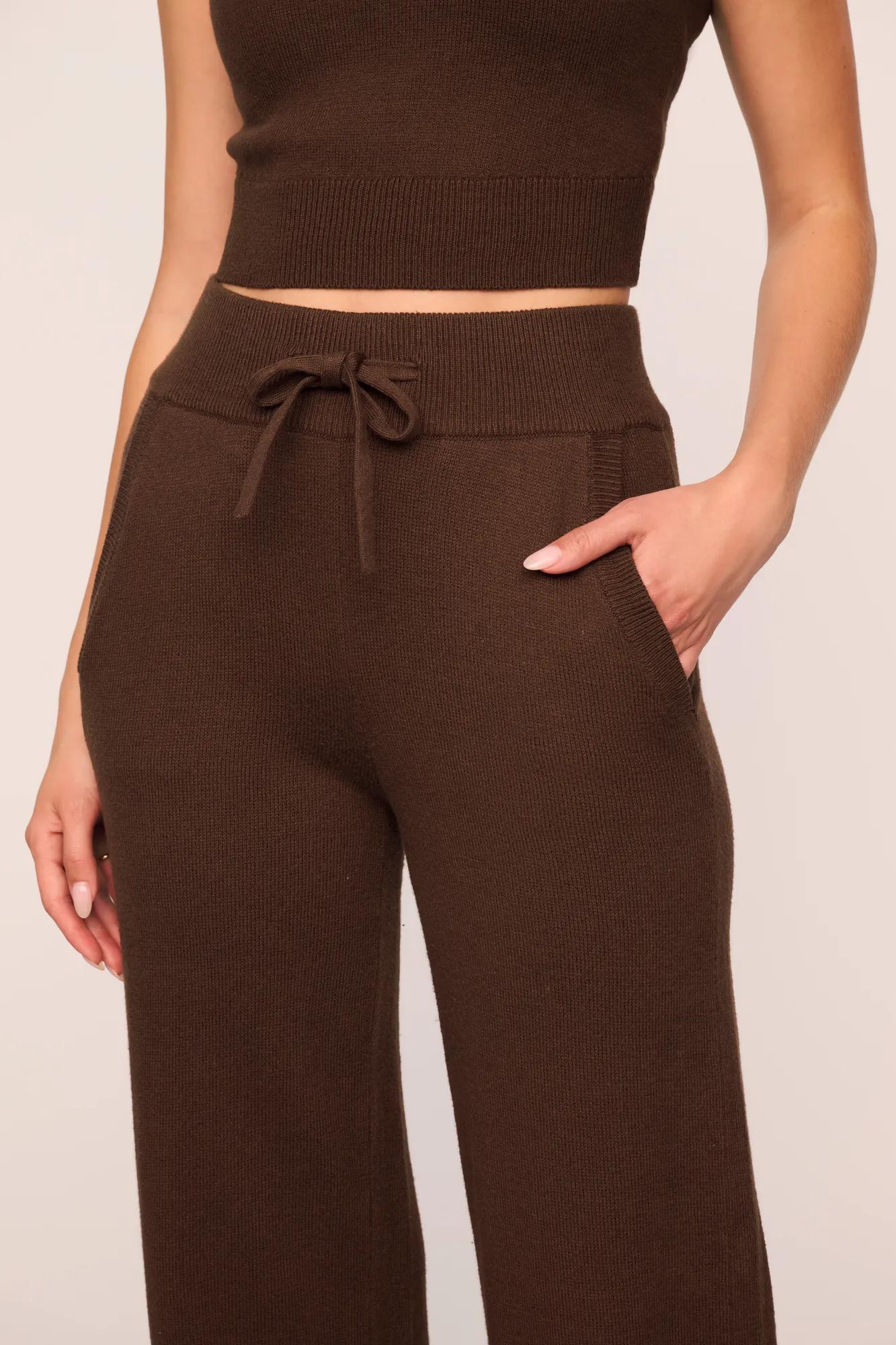 Model is wearing Recycled Sweater Pant  in  Chocolate