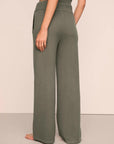 Model is wearing Recycled Sweater Pant  in Smokey Olive