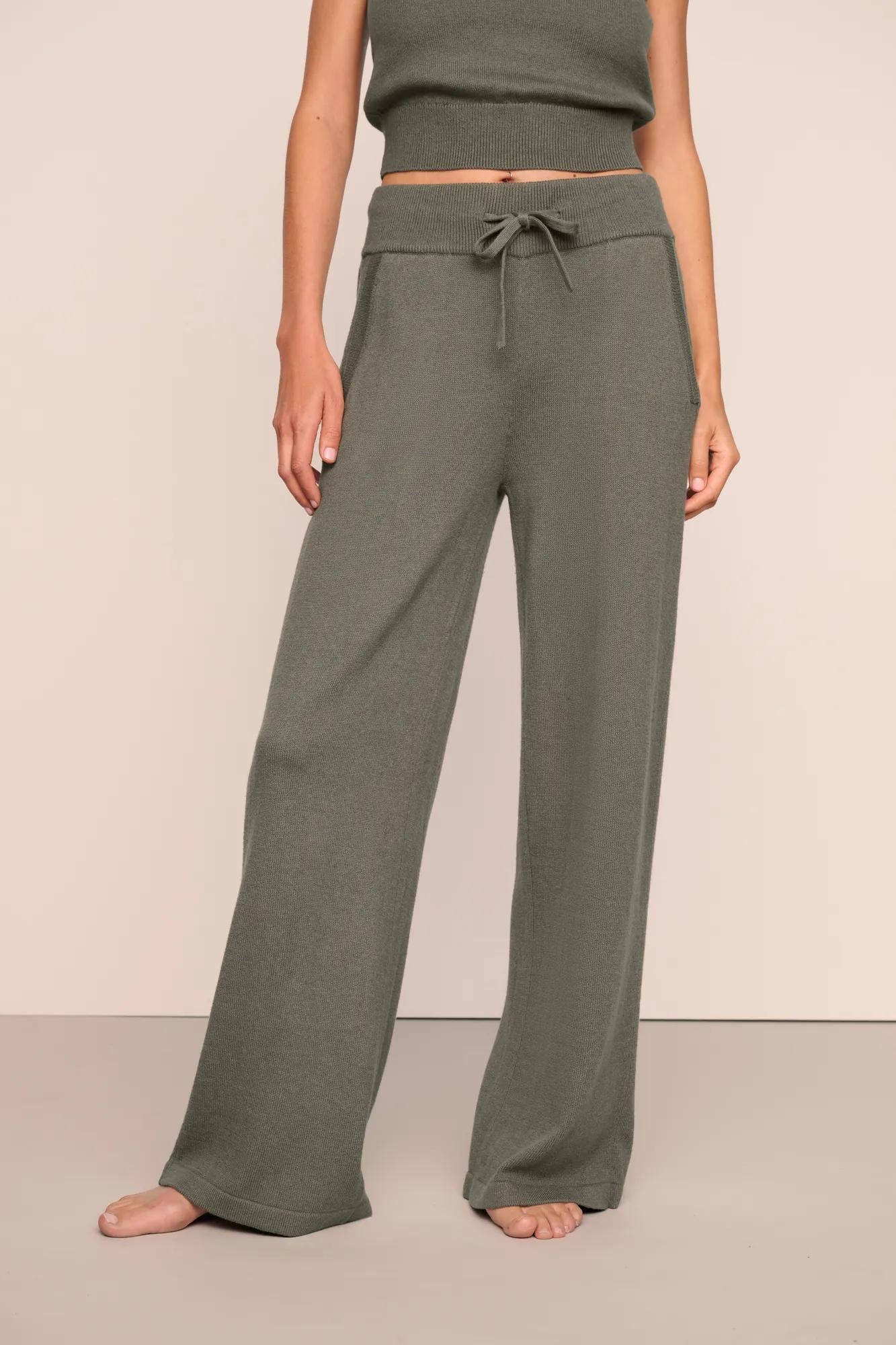 Model is wearing Recycled Sweater Pant  in Smokey Olive