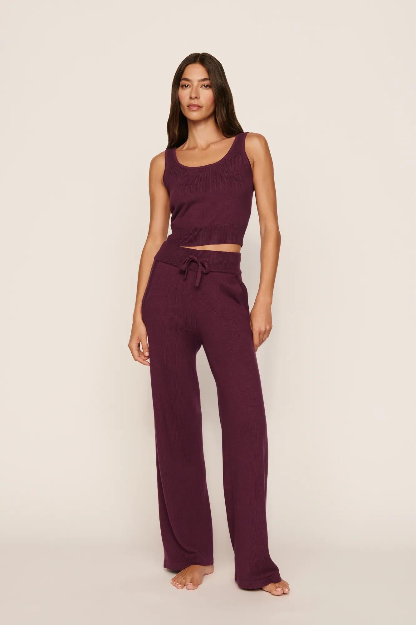 Model is wearing Recycled Sweater Pant in Wildberry