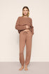 Model is wearing Recycled Sweater Slouchy Pant  in  Hazelnut