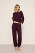 Model is wearing Recycled Sweater Slouchy Pant in Wildberry