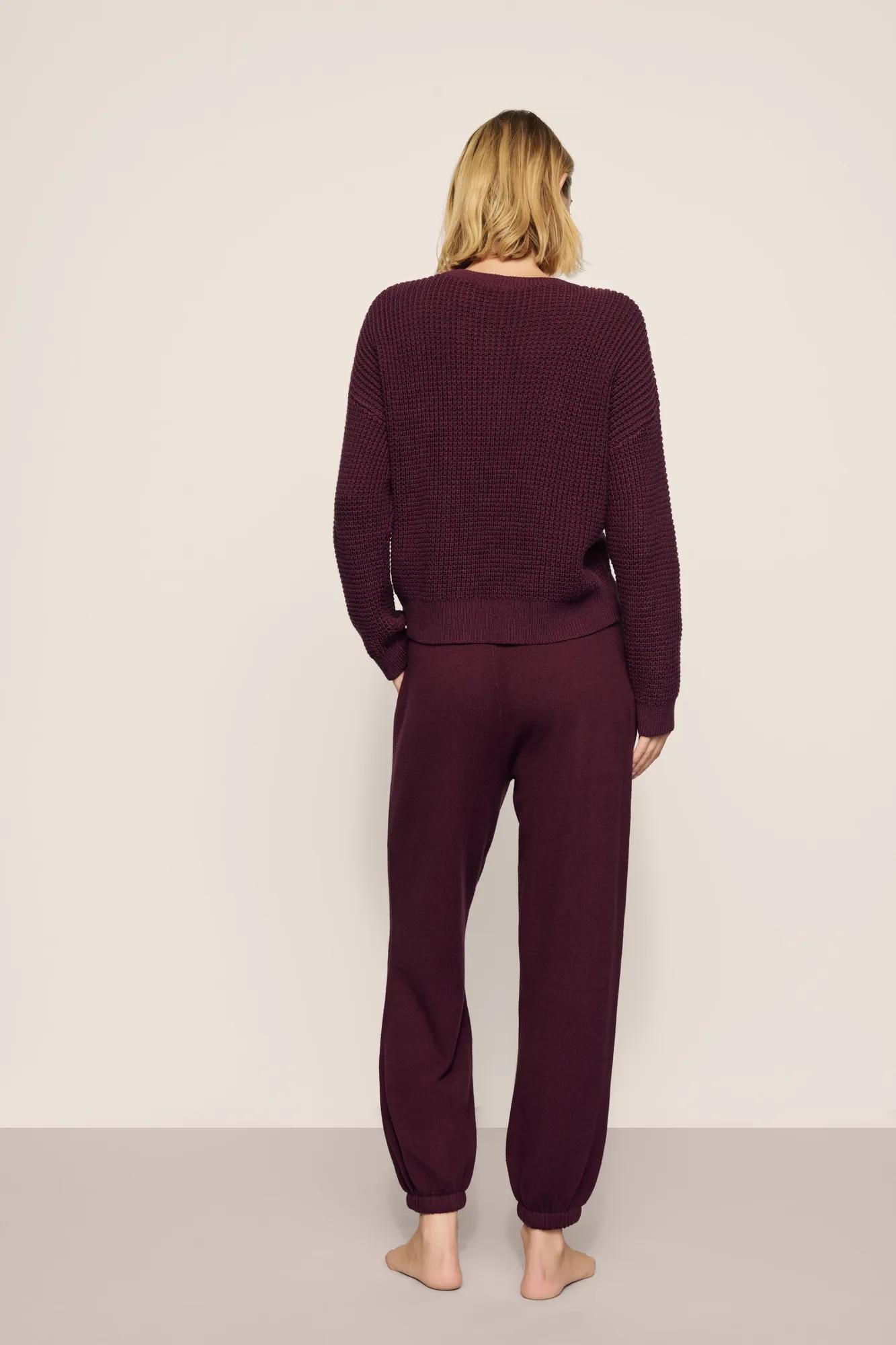 Model is wearing Recycled Sweater Slouchy Pant in Wildberry