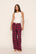 Model is wearing Flannel Boxer Pant in Oxford Check Holly Red