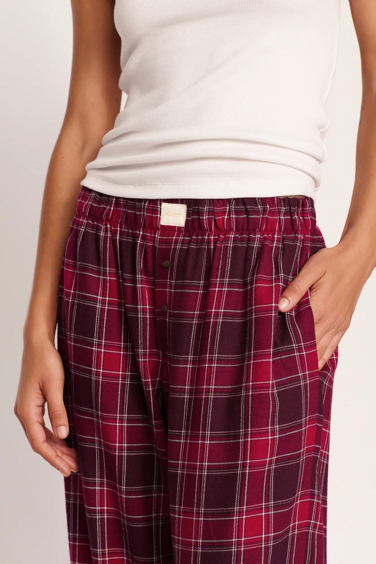 Model is wearing Flannel Boxer Pant in Oxford Check Holly Red