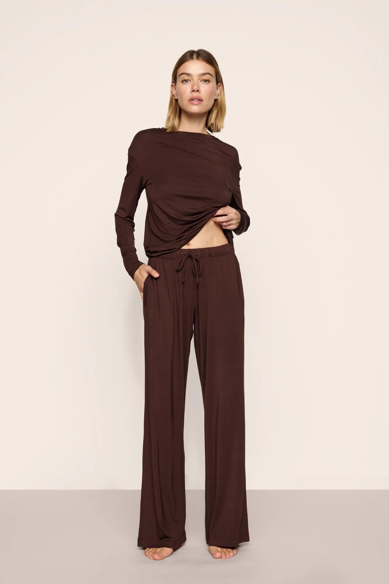 Model is wearing Gisele TENCEL™ Modal Everyday Straight Leg Pant in Chocolate