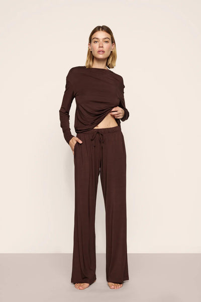 Model is wearing Gisele TENCEL™ Modal Everyday Straight Leg Pant in Chocolate