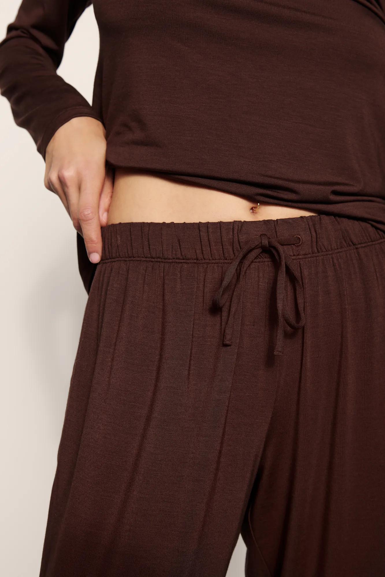 Model is wearing Gisele TENCEL™ Modal Everyday Straight Leg Pant in Chocolate