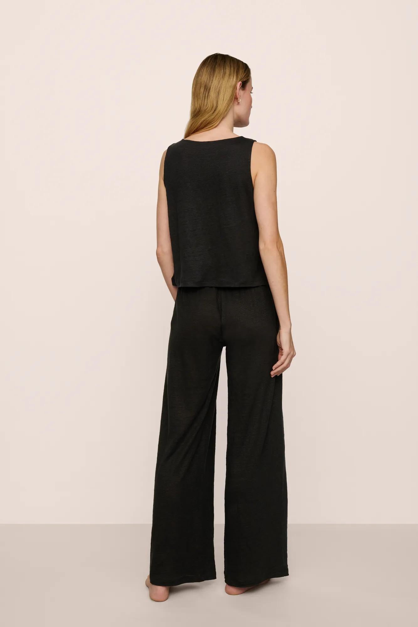 Model is wearing Organic Linen Knit High Waisted Pant in Black
