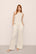 Model is wearing Organic Linen Knit High Waisted Pant in Ivory