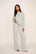 Model is wearing Cozy Time Pant in Blue Mist