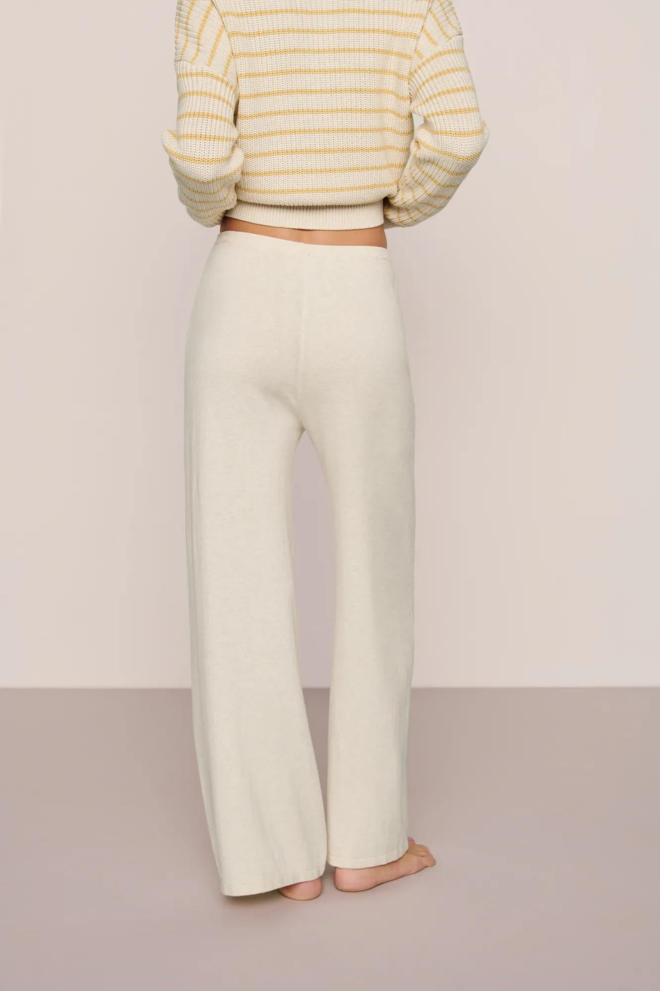 Model is wearing Fine Gauge Sweater Pant in Almond Heather