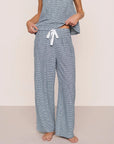 Model is wearing Linen Blend Relaxed Pant in Gingham White/Navy