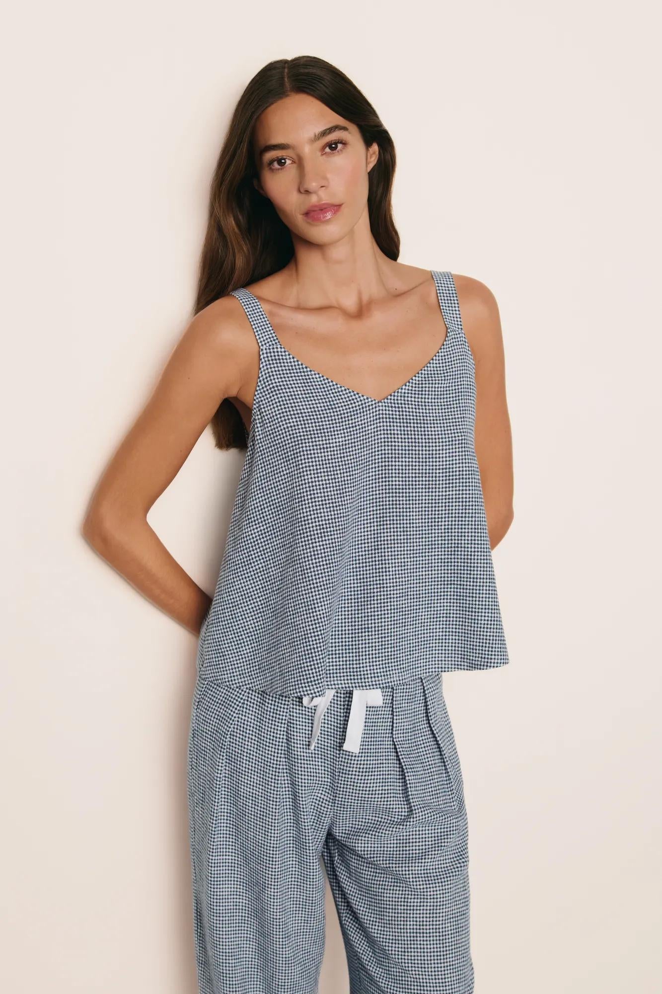 Model is wearing Linen Blend Relaxed Pant in Gingham White/Navy