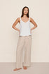 Model is wearing Linen Blend Relaxed Pant in Gingham White/Warm Taupe