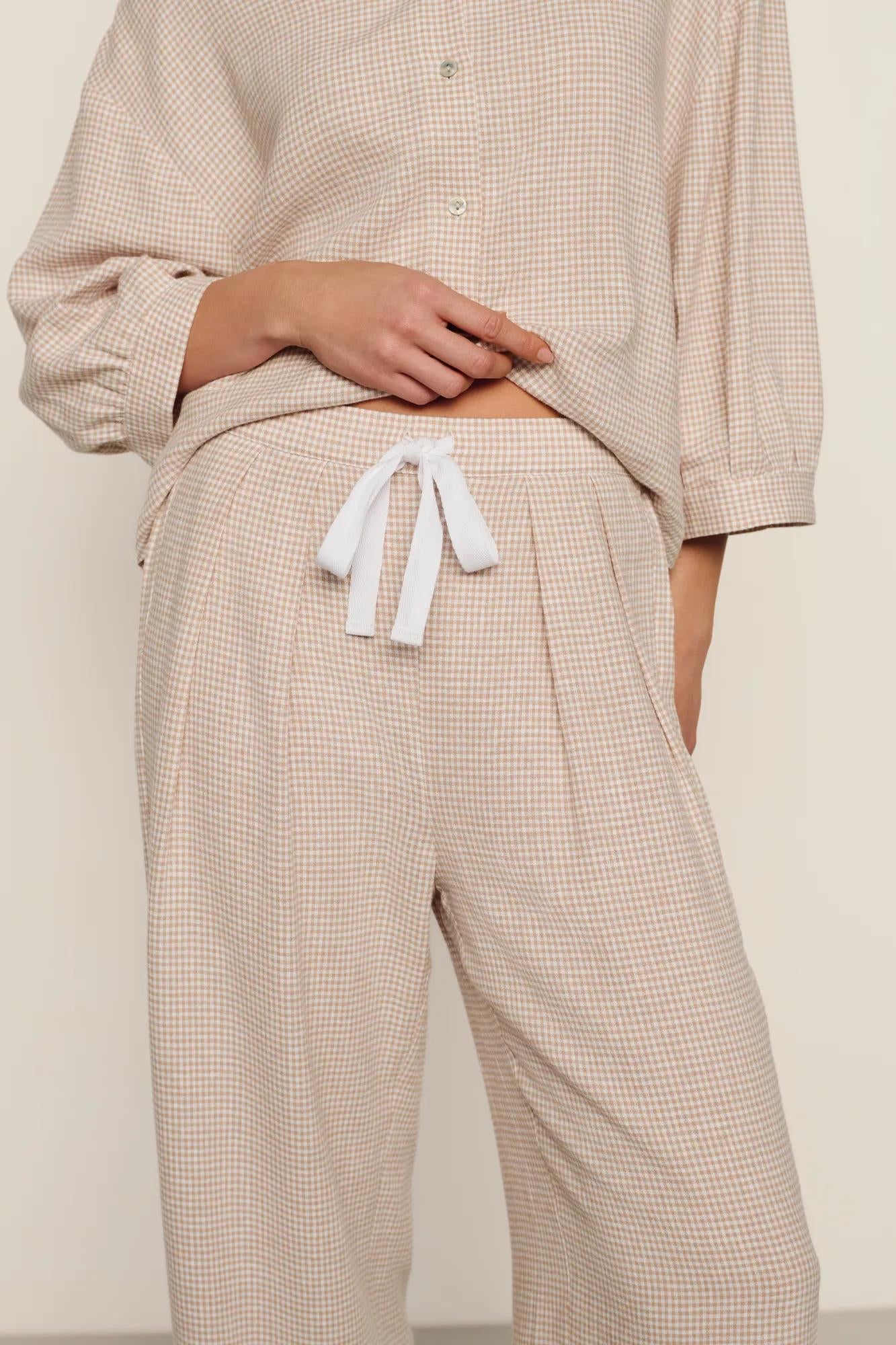 Model is wearing Linen Blend Relaxed Pant in Gingham White/Warm Taupe