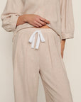 Model is wearing Linen Blend Relaxed Pant in Gingham White/Warm Taupe