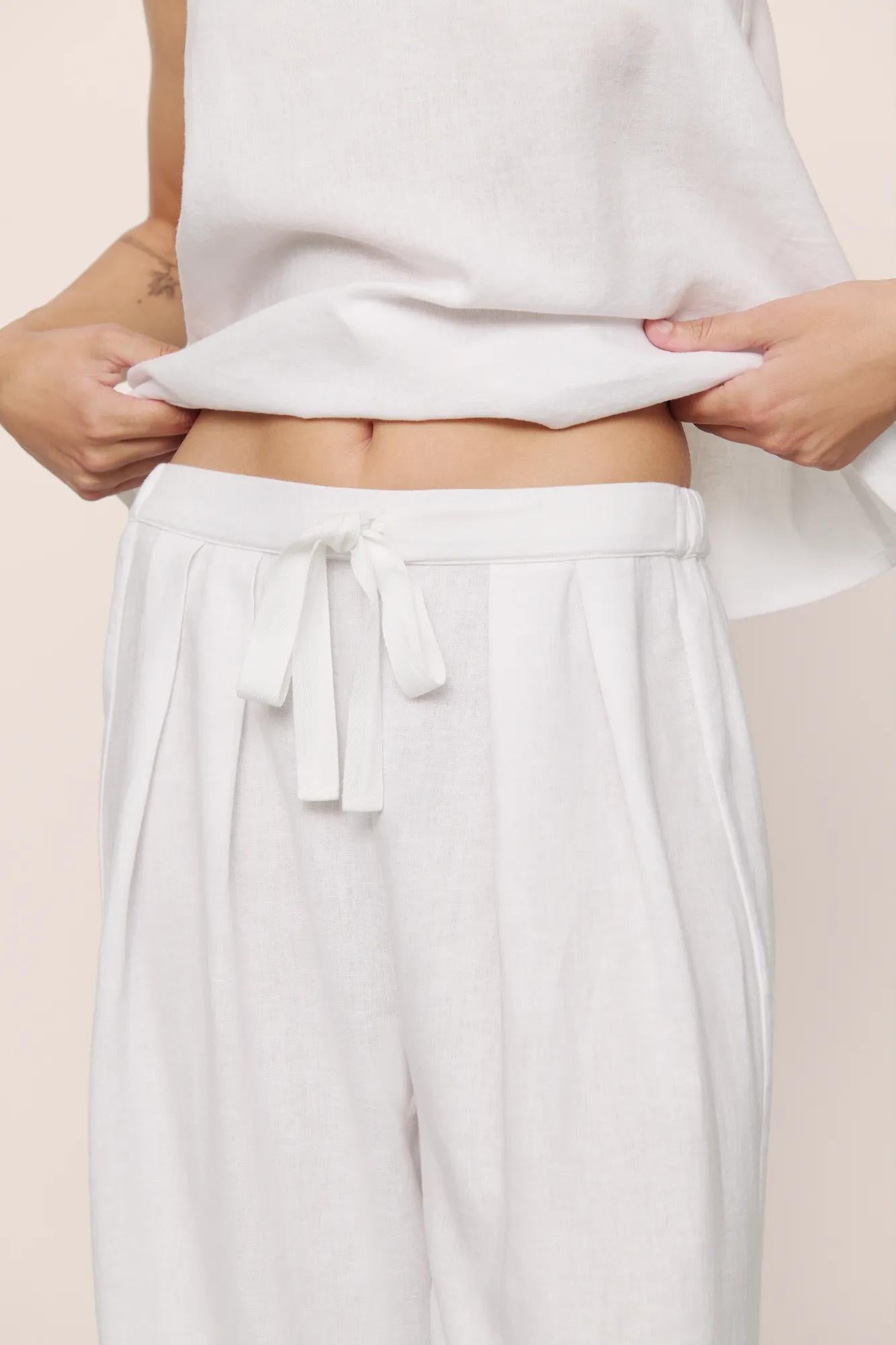 Model is wearing Linen Blend Relaxed Pant in White