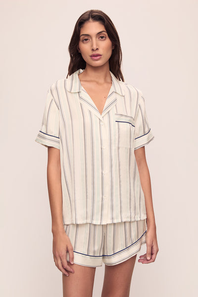 Model is wearing Inez Washable Silk Printed Short Pj Set in Serene Stripe Navy/Navy