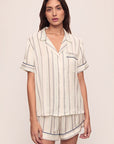 Model is wearing Inez Washable Silk Printed Short Pj Set in Serene Stripe Navy/Navy