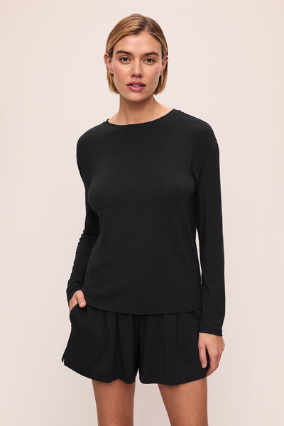 Model is wearing Gisele Tencel™ Modal Long Sleeve in Black
