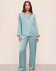 Model is wearing Inez Washable Silk Long Pj Set in Canal Blue/Ivory