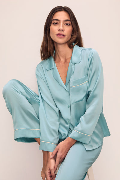 Model is wearing Inez Washable Silk Long Pj Set in Canal Blue/Ivory