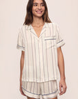 Model is wearing Inez Washable Silk Printed Short Pj Set in Serene Stripe Navy/Navy