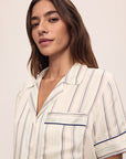 Model is wearing Inez Washable Silk Printed Short Pj Set in Serene Stripe Navy/Navy