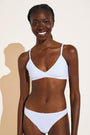 Model wears Pima Stretch Cotton Bralette in White.