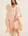 Model wears Inez Washable Silk Slip Dress in Rose Cloud.