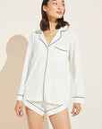 Model is wearing Gisele TENCEL™ Modal Long Sleeve & Shortie Short PJ Set in Ivory/Navy.