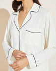 Model is wearing Gisele TENCEL™ Modal Long Sleeve & Shortie Short PJ Set in Ivory/Navy.