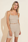 Model wears Pima Rib Cropped Cami in Oat.