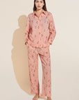 Model wears Organic Sandwashed Cotton Printed Long PJ Set in Animal Spot Rose Cloud.