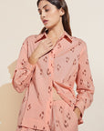 Model wears Organic Sandwashed Cotton Printed Long PJ Set in Animal Spot Rose Cloud.