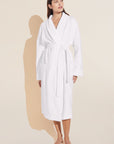 Model wears Terry Gender Neutral Robe in White.