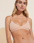 Model wears Pima Stretch Cotton Bralette in Buff.