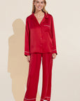 Model wears Inez Washable Silk Long PJ Set in Haute Red/Ivory.