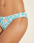 Model wears Annia Textured Bikini Bottom in Ocean Bay/Multi.