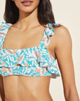 Model wears Jane Textured Bikini Top in tropical print.